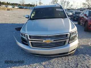 2020 Chevrolet Suburban Premier with VIN 1GNSCJKC9LR198484, listed as a Copart auction lot 87354514 with 115,008 mi miles and Salvage title. Bid and sale history available at DreamBid. Image 5.