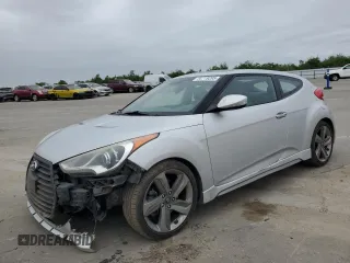 2013 Hyundai Veloster Turbo z VIN KMHTC6AE2DU158240, wystawiony jako Copart lot #54719205 z przebiegiem 147 652 mil mil oraz Szkody całkowita. Historia ofert i sprzedaży dostępna na DreamBid. Obrazek 1.