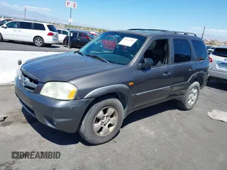 2003 Mazda Tribute ES with VIN 4F2CZ96113KM52877, listed as a IAAI auction lot 42217251 with 218,475 mi miles and . Bid and sale history available at DreamBid. Image 12.