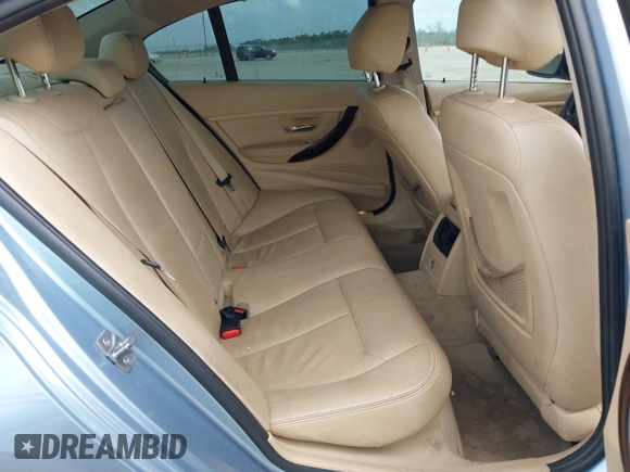 2013 BMW 3 Series 320i with VIN WBA3B1C54DK128284, listed as a IAAI auction lot 40315808 with 136,104 mi miles. Bid and sale history available at carsss.com. Image 8.