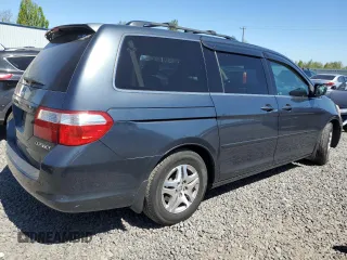 2005 Honda Odyssey EX with VIN 5FNRL38415B009502, listed as a Copart auction lot 53872455 with 205,051 mi miles and Salvage title. Bid and sale history available at DreamBid. Image 3.