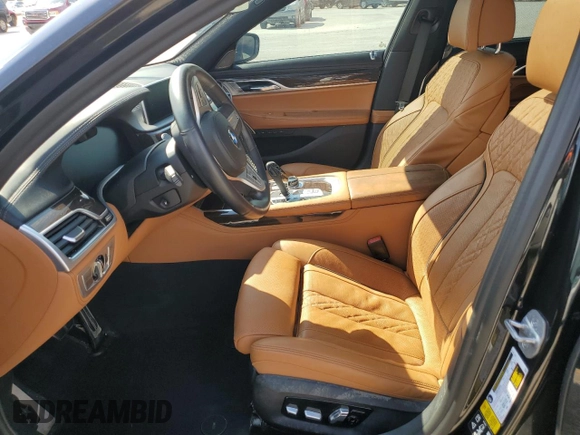 2022 BMW 7 Series 750i xDrive with VIN WBA7U2C01NCK83702, listed as a Copart auction lot 74327704 with Not provided miles and Salvage title. Bid and sale history available at DreamBid. Image 7.