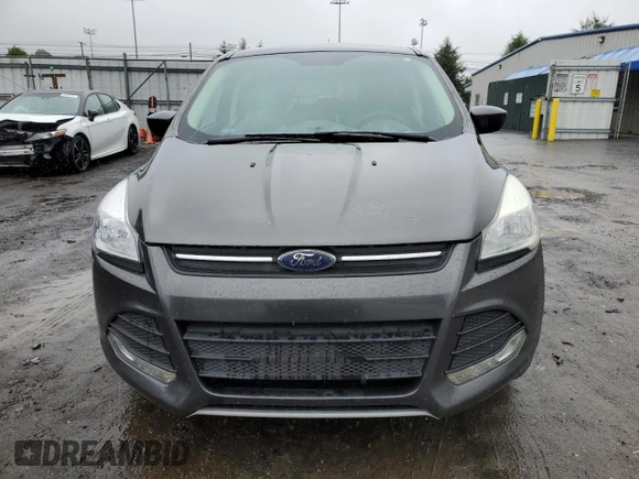 2016 Ford Escape SE z VIN 1FMCU9GX6GUA02410, wystawiony jako Copart lot #58623545 z przebiegiem 106 992 mil mil oraz Tytuł czysty. Historia ofert i sprzedaży dostępna na DreamBid. Obrazek 5.