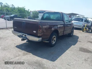 2000 Ford F-150 XL with VIN 1FTZF1721YNB05244, listed as a IAAI auction lot 42298391 with Not provided miles and . Bid and sale history available at DreamBid. Image 4.