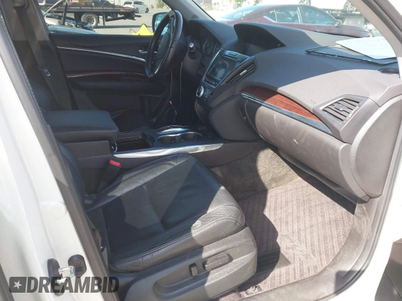 2016 Acura MDX w/Tech with VIN 5FRYD4H47GB045999, listed as a IAAI auction lot 42041010 with 124,096 mi miles. Bid and sale history available at carsss.com. Image 5.