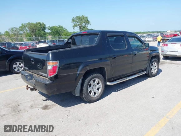 2008 Honda Ridgeline RTL with VIN 2HJYK16588H519676, listed as a IAAI auction lot 42561015 with 122,344 mi miles and . Bid and sale history available at DreamBid. Image 4.