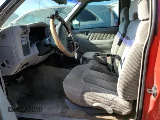 1997 GMC Sonoma SLS with VIN 1GTCS19XXVK506122, listed as a Copart auction lot 82875544 with 148,914 mi miles and Salvage Title. Bid and sale history available at carsss.com. Image 7.