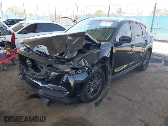 2020 Mazda CX-5 Touring with VIN JM3KFACM0L0804998, listed as a IAAI auction lot 41850998 with 44,519 mi miles. Bid and sale history available at carsss.com. Image 17.