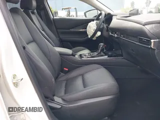 2023 Mazda CX-30 S Carbon Edition with VIN 3MVDMBCM0PM569100, listed as a IAAI auction lot 41978191 with 20,470 mi miles and . Bid and sale history available at DreamBid. Image 5.