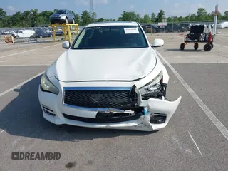 2014 Infiniti Q50 Sport with VIN JN1BV7AR4EM698230, listed as a IAAI auction lot 42664588 with 129,411 mi miles and . Bid and sale history available at DreamBid. Image 12.