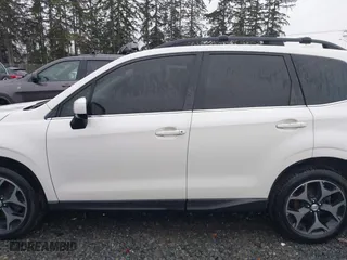 2016 Subaru Forester 2.0XT Premium with VIN JF2SJGDC1GH504685, listed as a IAAI auction lot 41444148 with 138,188 mi miles. Bid and sale history available at carsss.com. Image 14.