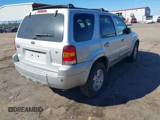 2007 Ford Escape Limited with VIN 1FMYU04197KA67054, listed as a IAAI auction lot 41665928 with 196,706 mi miles and . Bid and sale history available at DreamBid. Image 4.