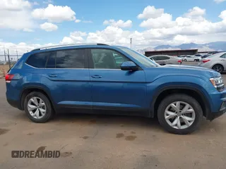 2019 Volkswagen Atlas SE with VIN 1V2WR2CA4KC577548, listed as a IAAI auction lot 41964877 with 74,361 mi miles and . Bid and sale history available at DreamBid. Image 13.