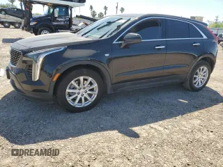2023 Cadillac XT4 FWD Luxury z VIN 1GYAZAR46PF178003, wystawiony jako Copart lot #52024665 z przebiegiem 42 000 mil mil oraz Szkoda całkowita • Salvage title. Historia ofert i sprzedaży dostępna na DreamBid. Obrazek 1.