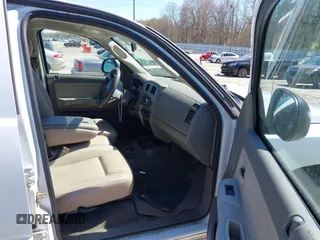 2006 Dodge Dakota SLT with VIN 1D7HE48N86S639435, listed as a IAAI auction lot 41863389 with 173,248 mi miles and . Bid and sale history available at carsss.com. Image 5.