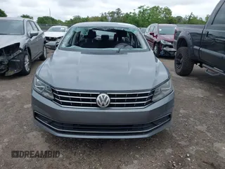 2017 Volkswagen Passat S with VIN 1VWAT7A38HC004849, listed as a IAAI auction lot 41994444 with 117,953 mi miles and . Bid and sale history available at DreamBid. Image 12.