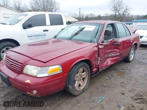 2002 Ford Crown Victoria LX z VIN 2FAFP74W82X148324, wystawiony jako IAAI lot #41565717 z przebiegiem 114 536 mil mil oraz . Historia ofert i sprzedaży dostępna na DreamBid. Obrazek 2.