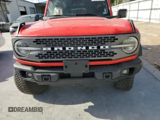 2023 Ford Bronco z VIN 1FMEE5DP6PLC01420, wystawiony jako Copart lot #52883195 z przebiegiem 11 620 mil mil oraz Szkoda całkowita • Salvage title. Historia ofert i sprzedaży dostępna na DreamBid. Obrazek 5.