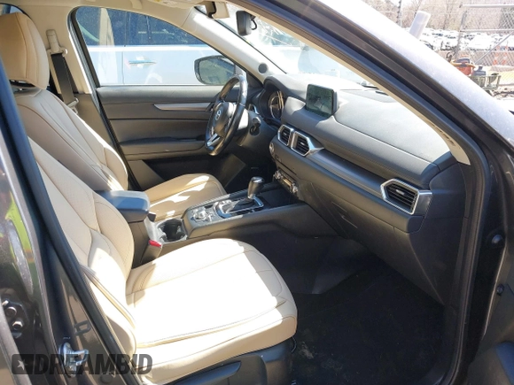 2017 Mazda CX-5 Touring with VIN JM3KFBCL2H0203497, listed as a IAAI auction lot 41860782 with 65,482 mi miles. Bid and sale history available at carsss.com. Image 5.