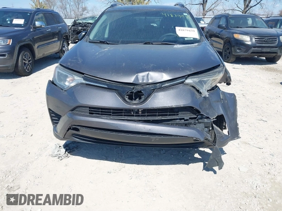 2016 Toyota RAV4 LE with VIN 2T3BFREV6GW482446, listed as a IAAI auction lot 41879439 with 144,693 mi miles. Bid and sale history available at carsss.com. Image 6.
