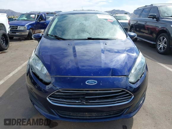 2016 Ford Fiesta SE with VIN 3FADP4EJ4GM199945, listed as a IAAI auction lot 41881260 with 98,945 mi miles. Bid and sale history available at carsss.com. Image 6.