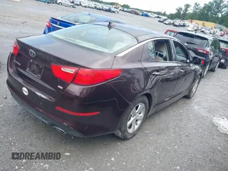 2014 Kia Optima LX with VIN 5XXGM4A70EG260667, listed as a IAAI auction lot 42531882 with 147,829 mi miles and . Bid and sale history available at DreamBid. Image 4.