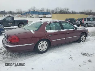 2002 Lincoln Continental with VIN 1LNHM97V62Y684873, listed as a Copart auction lot 87602665 with 52,974 mi miles and Salvage Title. Bid and sale history available at carsss.com. Image 3.