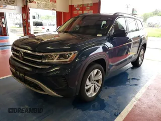 2023 Volkswagen Atlas SE z VIN 1V2HR2CA5PC527628, wystawiony jako IAAI lot #42569146 z przebiegiem 27 424 mil mil oraz . Historia ofert i sprzedaży dostępna na DreamBid. Obrazek 26.