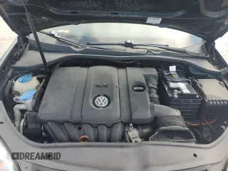 2010 Volkswagen Jetta S with VIN 3VWJZ7AJ3AM029692, listed as a Copart auction lot 61743435 with Not provided miles and Salvage title. Bid and sale history available at DreamBid. Image 11.