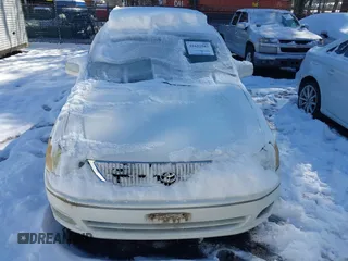2001 Toyota Avalon XL z VIN 4T1BF28B31U159772, wystawiony jako IAAI lot #41622587 z przebiegiem 175 456 mil mil oraz . Historia ofert i sprzedaży dostępna na DreamBid. Obrazek 12.