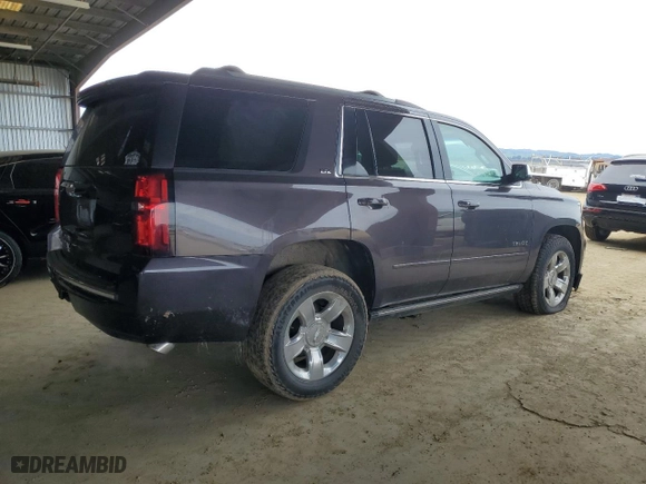2016 Chevrolet Tahoe LTZ with VIN 1GNSKCKC2GR277192, listed as a Copart auction lot 49552145 with 131,659 mi miles and Salvage Title. Bid and sale history available at carsss.com. Image 3.