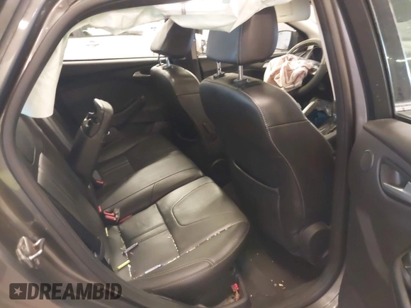 2013 Ford Focus Titanium with VIN 1FADP3J23DL265049, listed as a IAAI auction lot 41765621 with 100,550 mi miles and . Bid and sale history available at carsss.com. Image 8.
