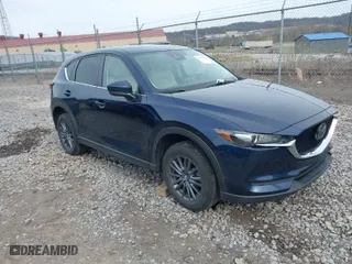 2019 Mazda CX-5 Touring with VIN JM3KFBCM5K0689948, listed as a IAAI auction lot 41976266 with 74,812 mi miles. Bid and sale history available at carsss.com. Image 1.
