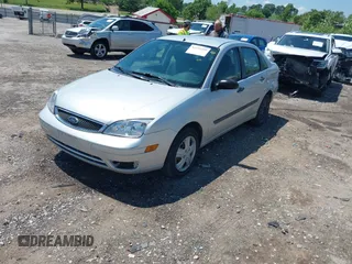 2007 Ford Focus S z VIN 1FAFP34N57W109953, wystawiony jako IAAI lot #42225399 z przebiegiem Nie podano mil oraz . Historia ofert i sprzedaży dostępna na DreamBid. Obrazek 19.
