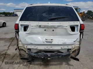 2015 Jeep Grand Cherokee Overland z VIN 1C4RJFCG2FC159481, wystawiony jako Copart lot #58328665 z przebiegiem 114 719 mil mil oraz Szkoda całkowita • Salvage title. Historia ofert i sprzedaży dostępna na DreamBid. Obrazek 6.