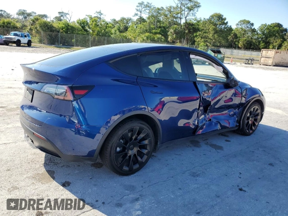 2020 Tesla Model Y Long Range with VIN 5YJYGDEE8LF034719, listed as a Copart auction lot 50888365 with 55,307 mi miles and Salvage Title. Bid and sale history available at DreamBid. Image 3.