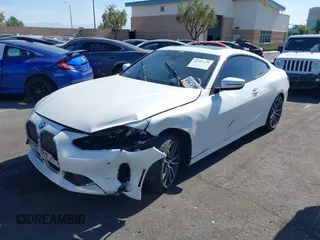 2022 BMW 4 Series 430i xDrive with VIN WBA73AP03NCH61029, listed as a IAAI auction lot 42327779 with 104,860 mi miles and . Bid and sale history available at DreamBid. Image 2.