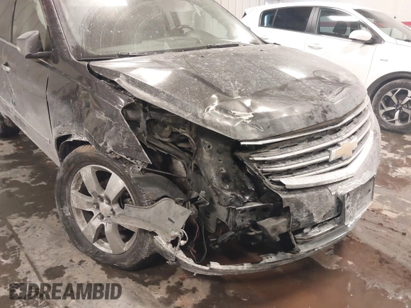 2015 Chevrolet Traverse LTZ with VIN 1GNKVJKD8FJ360899, listed as a IAAI auction lot 41634924 with 165,835 mi miles and . Bid and sale history available at DreamBid. Image 6.