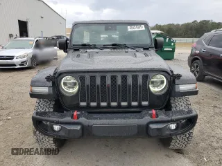2019 Jeep Wrangler Unlimited Rubicon with VIN 1C4HJXFN6KW665805, listed as a Copart auction lot 45424005 with 141,007 mi miles and Salvage title. Bid and sale history available at DreamBid. Image 5.