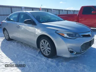 2013 Toyota Avalon XLE with VIN 4T1BK1EBXDU009947, listed as a IAAI auction lot 41562857 with 174,764 mi miles and . Bid and sale history available at DreamBid. Image 1.