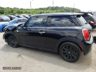 2021 MINI Hardtop 2 Door Cooper with VIN WMWXR3C08M2N08791, listed as a Copart auction lot 60584014 with 36,207 mi miles and Salvage Title. Bid and sale history available at carsss.com. Image 2.