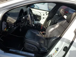 2013 Jaguar XF with VIN SAJWA8JC7DMS77243, listed as a Copart auction lot 77583544 with Not Provided miles and Salvage Title. Bid and sale history available at DreamBid. Image 7.
