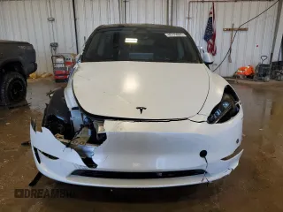 2023 Tesla Model Y Long Range z VIN 7SAYGAEE5PF672546, wystawiony jako Copart lot #42779065 z przebiegiem 27 570 mil mil oraz Nie do naprawy • Non repairable. Historia ofert i sprzedaży dostępna na DreamBid. Obrazek 5.