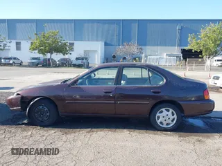 1999 Nissan Altima XE with VIN 1N4DL01D3XC209869, listed as a IAAI auction lot 41414580 with 175,076 mi miles. Bid and sale history available at carsss.com. Image 14.