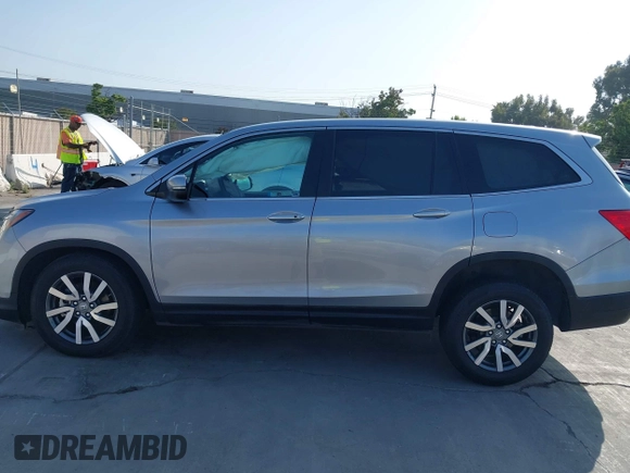 2021 Honda Pilot EX with VIN 5FNYF5H37MB014384, listed as a IAAI auction lot 42412500 with 36,934 mi miles and . Bid and sale history available at DreamBid. Image 15.
