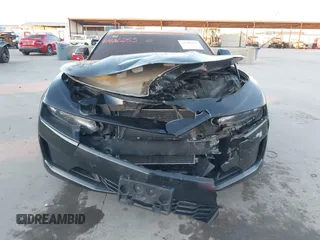 2019 Chevrolet Camaro 1LT z VIN 1G1FB1RX6K0133447, wystawiony jako IAAI lot #41406255 z przebiegiem 125 267 mil mil oraz . Historia ofert i sprzedaży dostępna na DreamBid. Obrazek 13.