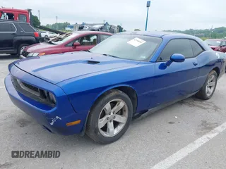 2012 Dodge Challenger SXT Plus z VIN 2C3CDYAG9CH239160, wystawiony jako IAAI lot #42198261 z przebiegiem 116 546 mil mil oraz . Historia ofert i sprzedaży dostępna na DreamBid. Obrazek 17.