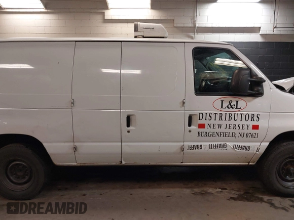 2014 Ford Econoline Cargo Commercial with VIN 1FTSS3EL3EDA06883, listed as a IAAI auction lot 41201589 with 154,796 mi miles and . Bid and sale history available at DreamBid. Image 13.