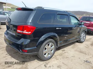 2014 Dodge Journey Limited with VIN 3C4PDDDG8ET150059, listed as a IAAI auction lot 41915239 with 120,897 mi miles and . Bid and sale history available at carsss.com. Image 4.