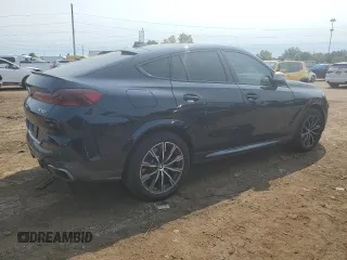 2021 BMW X6 M50i with VIN 5UXCY8C04M9E36899, listed as a Copart auction lot 68819334 with 72,808 mi miles and Salvage Title. Bid and sale history available at carsss.com. Image 3.